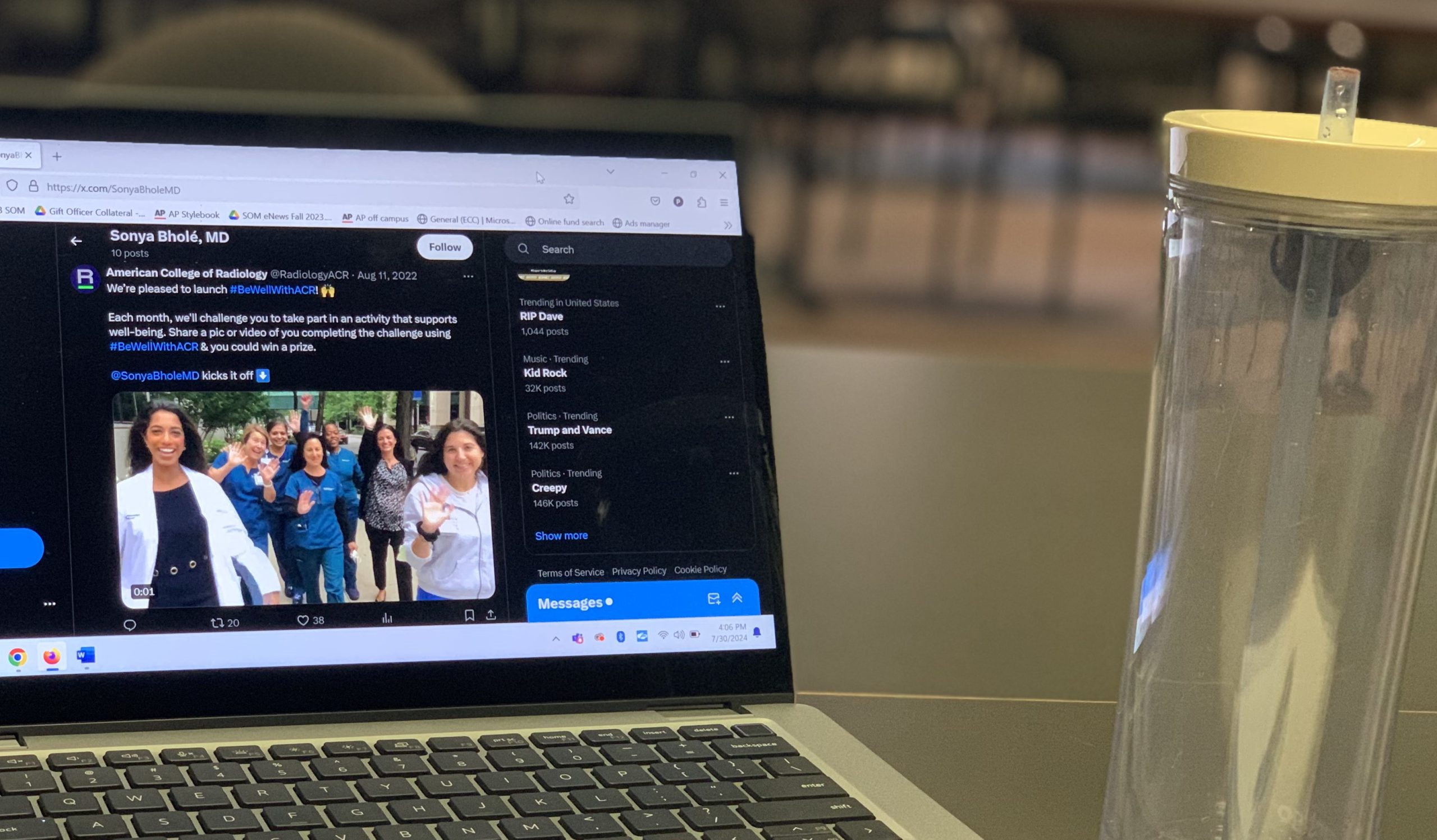 A person reads news on Twitter displayed on a laptop screen, illustrating the trend of Americans using social media for news consumption.